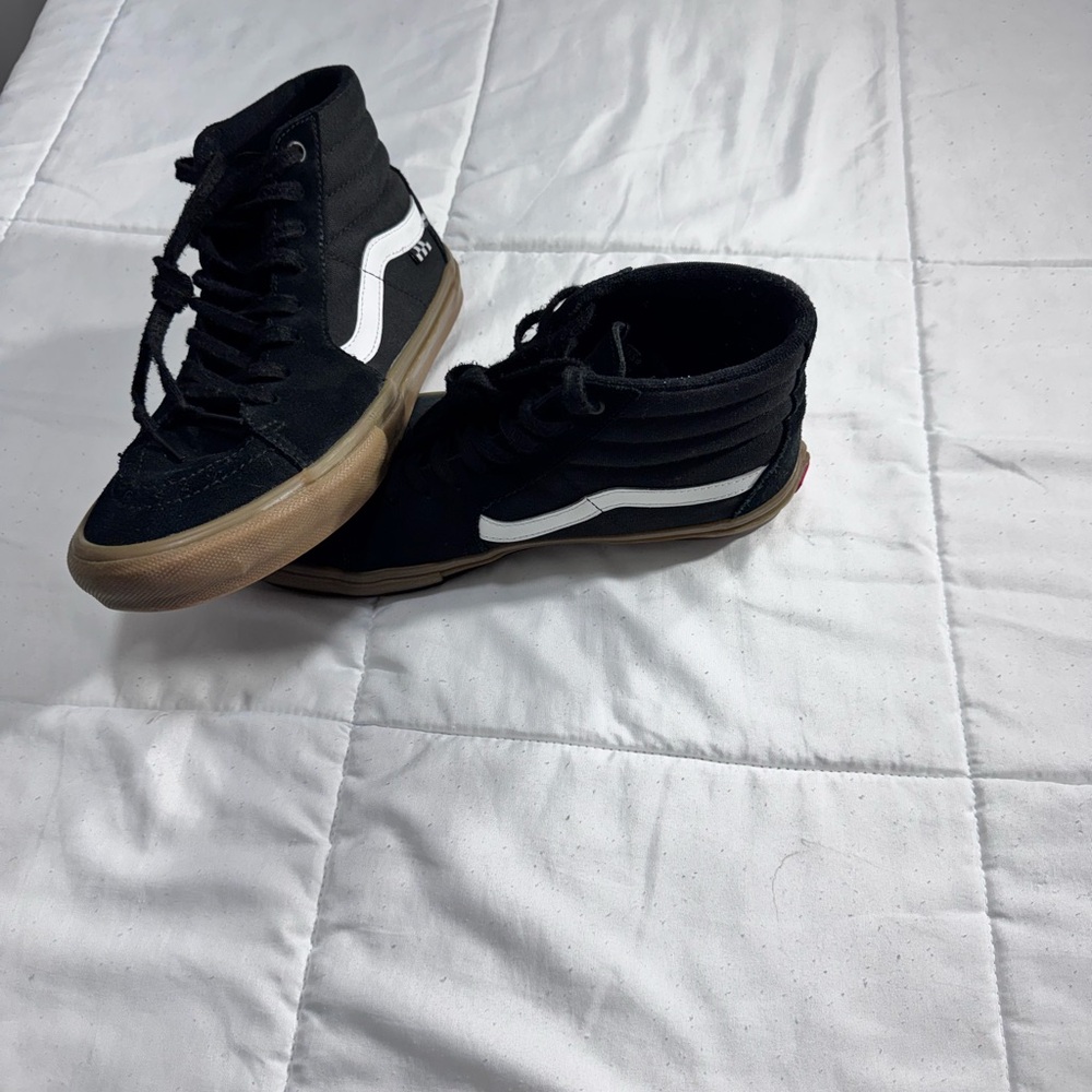 Vans Black and White High-Top Sneakers